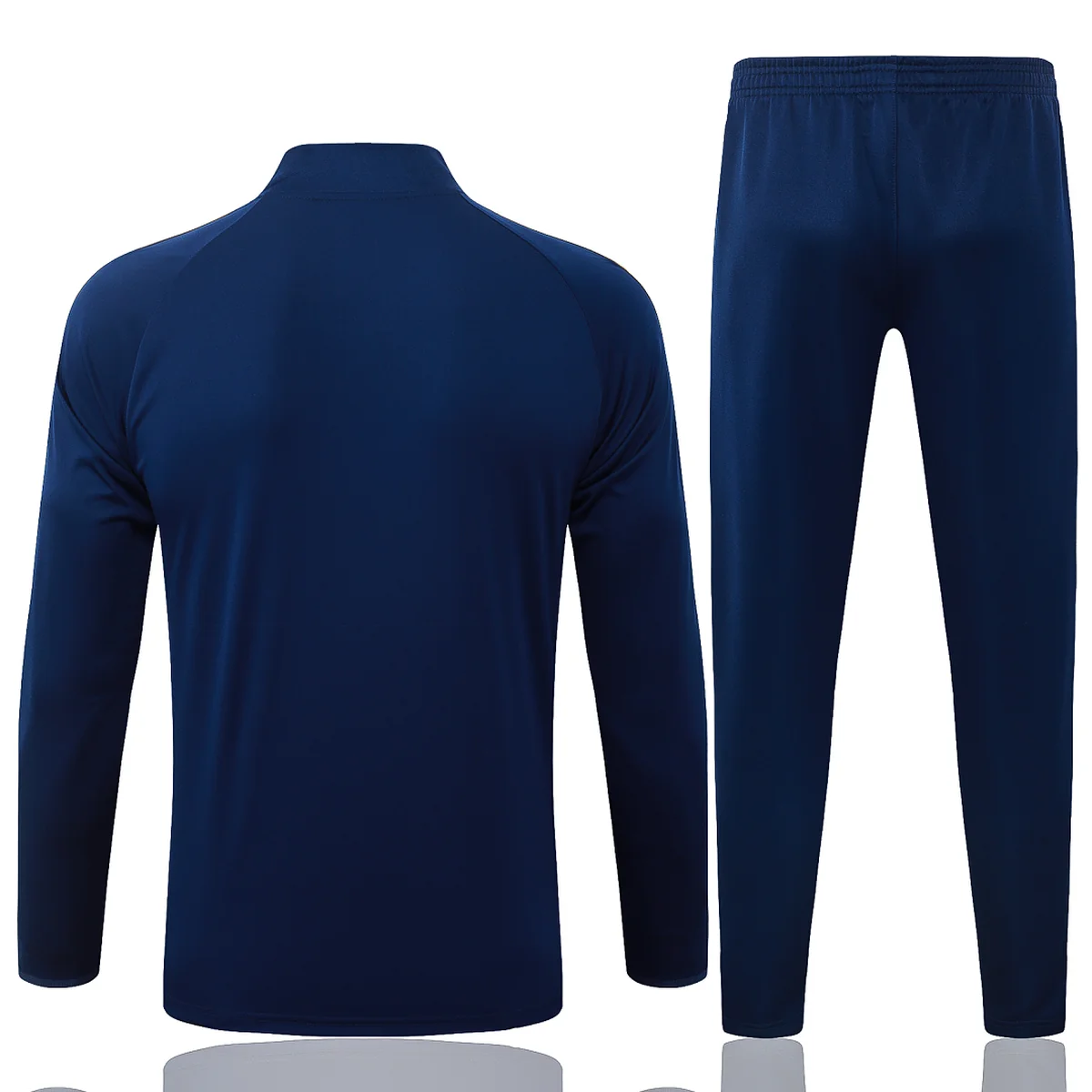 Real Madrid 2026/27 tuta blu mezza zip strisce oro