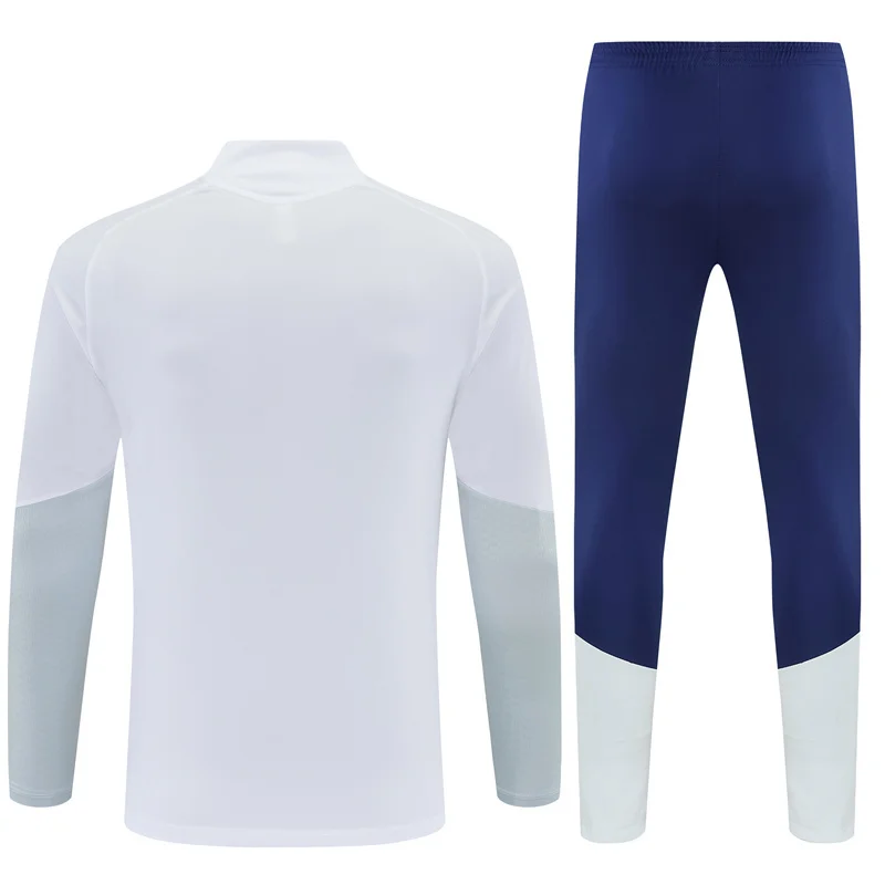 Real Madrid 2026/27 Tuta Bianca e Blu con Mezza Zip