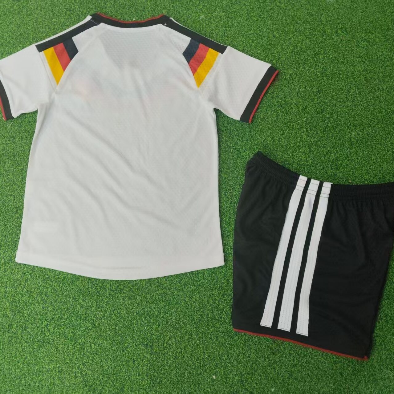 Tifoso Store Bambino Germania Home 2026 completo bambino maglia+pantaloncini