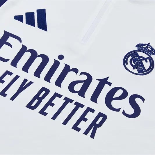 Real Madrid 2026/27 Tuta Bianca e Blu con Mezza Zip