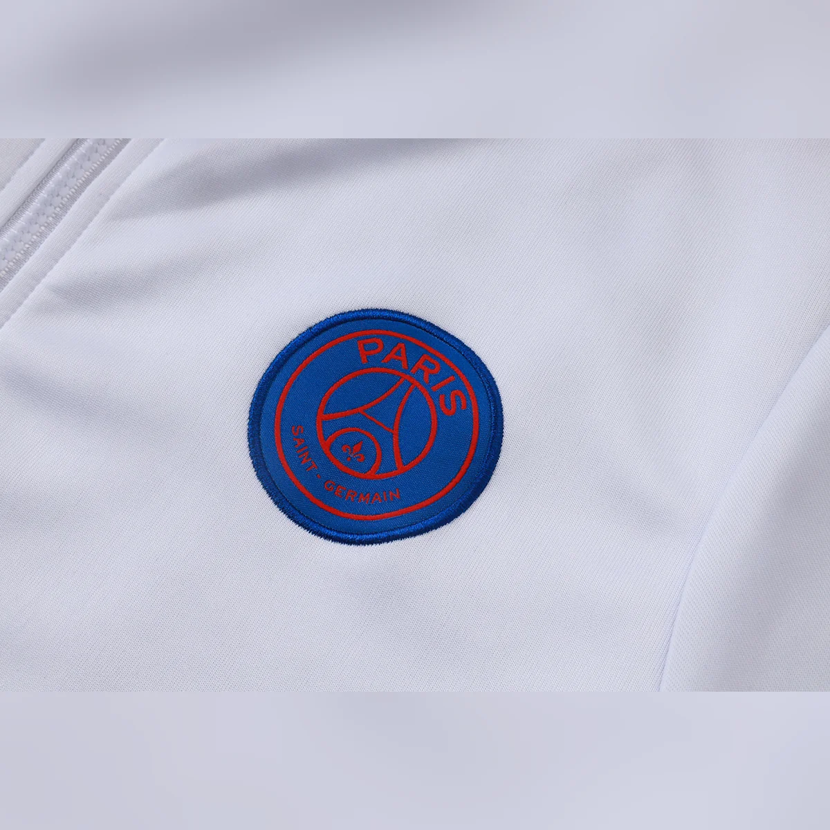 Tifoso Store PSG 2026/27 tuta bianca full zip bande rosse
