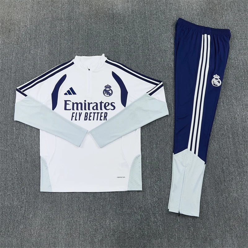 Real Madrid 2026/27 Tuta Bianca e Blu con Mezza Zip