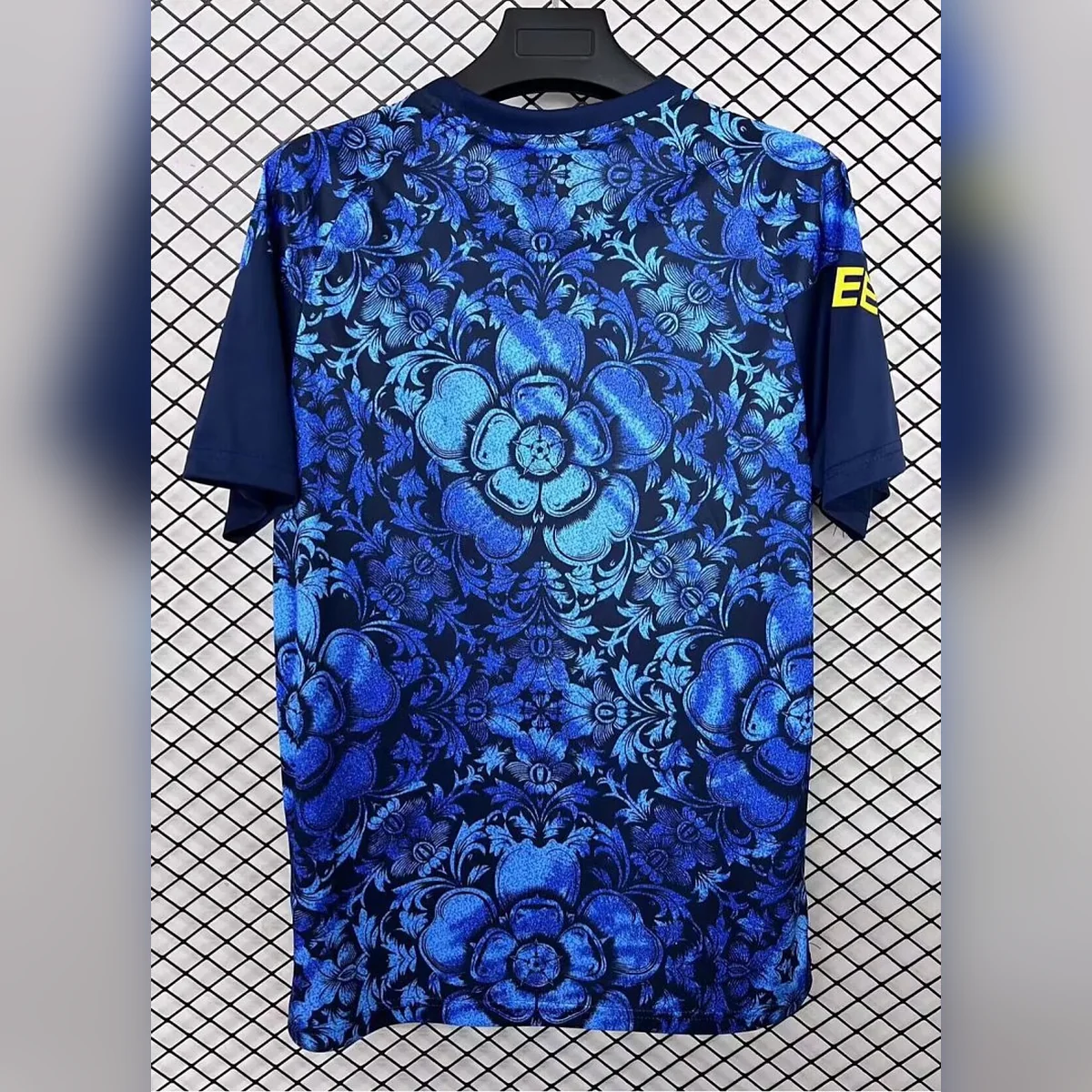 Leeds United 2026/27 maglia prepartita blu floreale