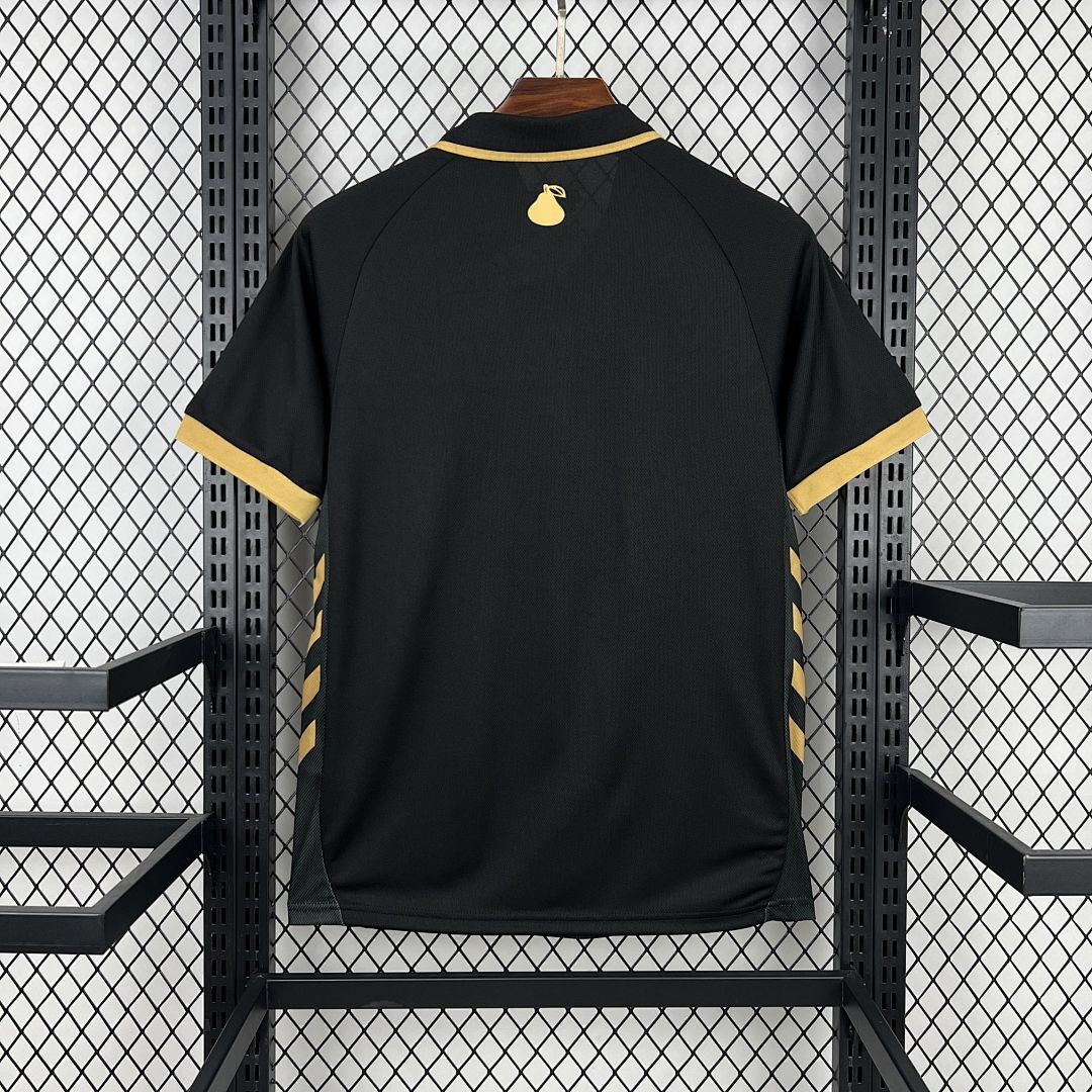 Málaga Legado 2025/26 maglia retro nera oro
