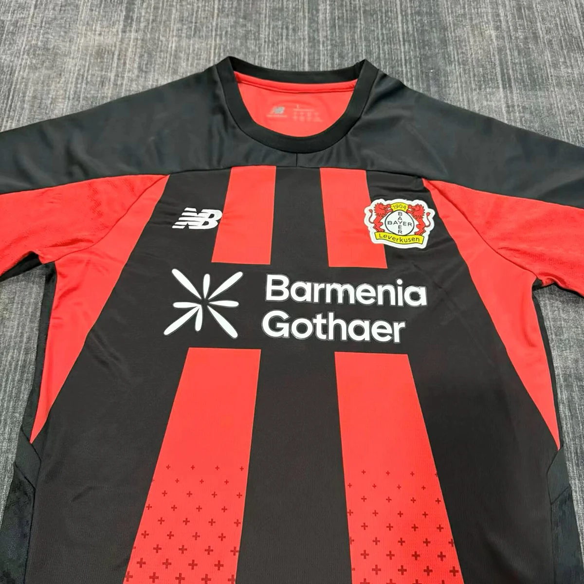 Tifoso Store Leverkusen Home 2026/27 maglia rossonera bande