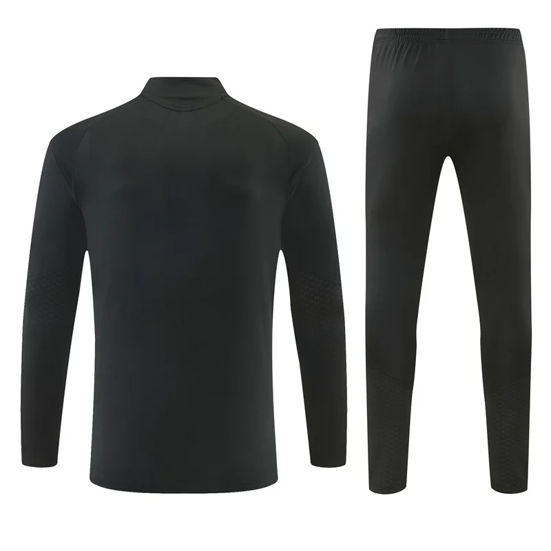 Real Madrid Bambino Total Black 2026/27 tuta total black mezza zip