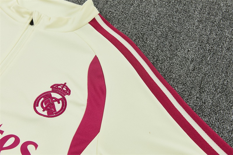 Real Madrid 2026/27 tuta crema mezza zip S-XXL stemma