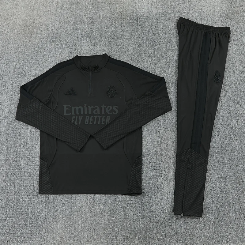 Real Madrid Bambino Total Black 2026/27 tuta total black mezza zip