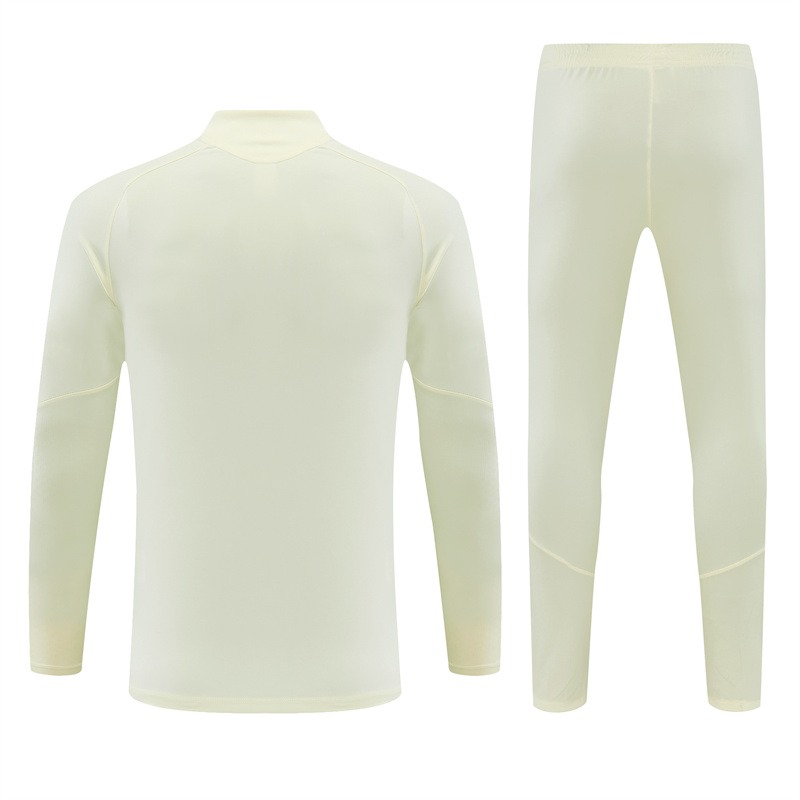 Real Madrid 2026/27 tuta crema mezza zip S-XXL stemma