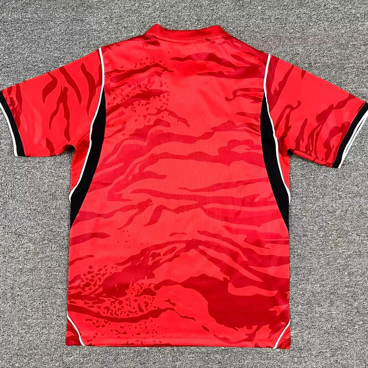 Corea del Sud Mondiale 2026 maglia prima divisa rossa tigrata