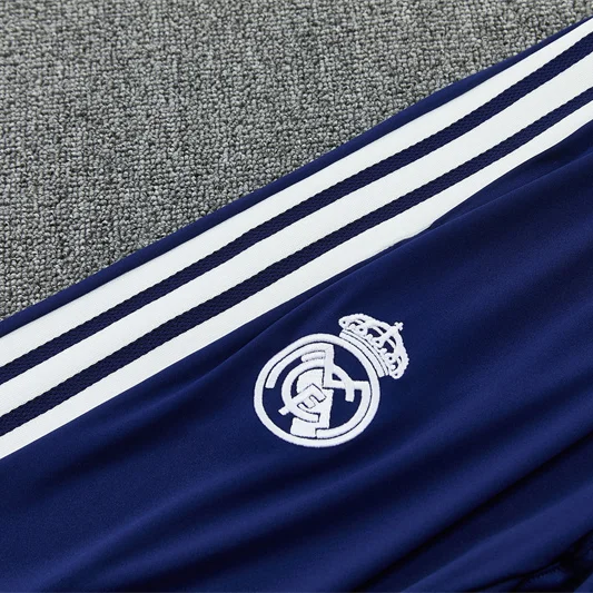 Real Madrid 2026/27 Tuta Bianca e Blu con Mezza Zip