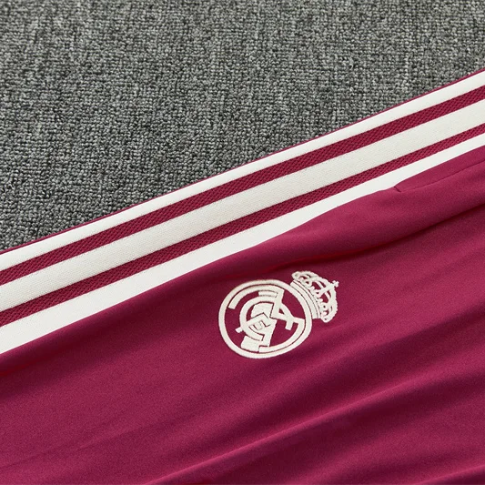 Real Madrid Tuta Fucsia 2026/27 tuta sportiva mezza zip
